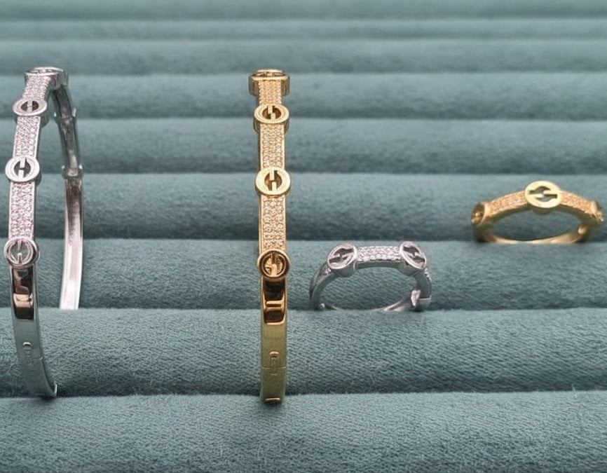 Modern Cross-Bar Zirconia Bangle & Ring Set in UAE – Gold & Silver Circle Emblem Jewelry for Women, Daily & Party Wear